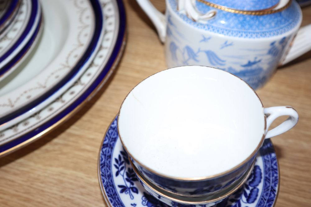 A collection of blue and white dinner ware and a Cauldon dinner service